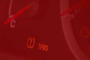 Picture of the tire pressure monitoring system light on in a car